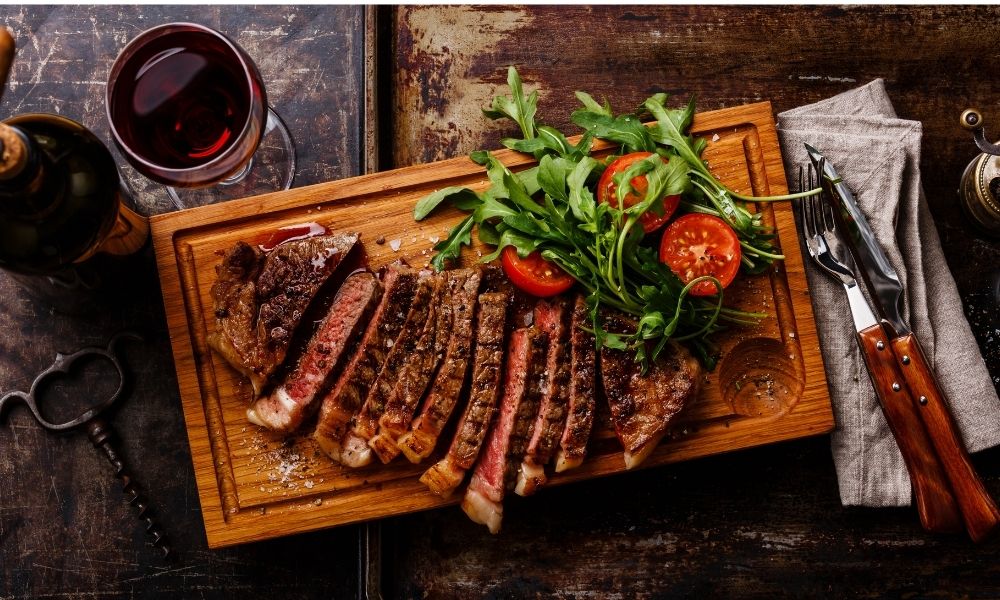 steak on a wooden board